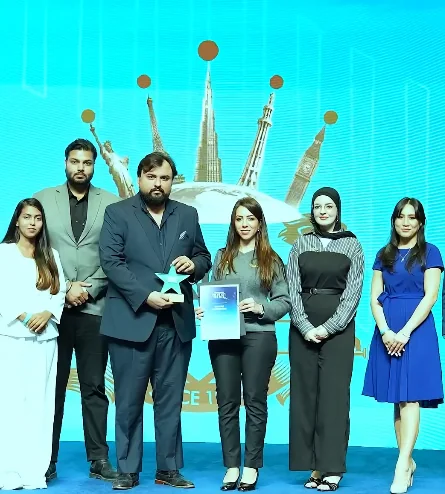 Throne Properties team members receiving a star award on stage